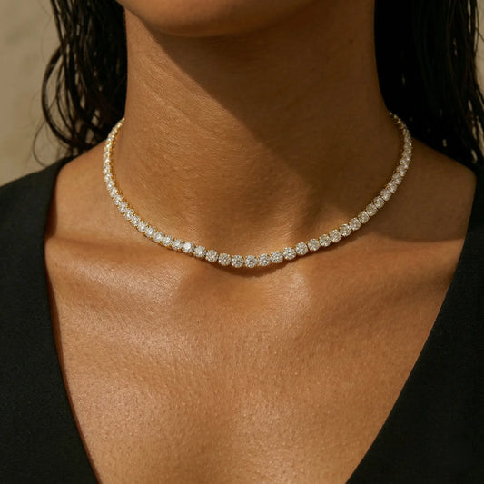 Close-up of a gold diamond waterproof choker on a model.