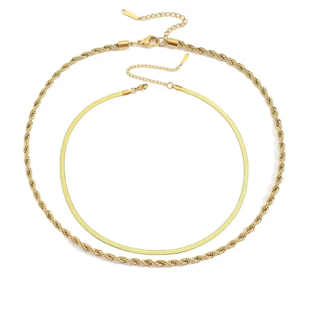 Gold-plated double chain necklace on a white background