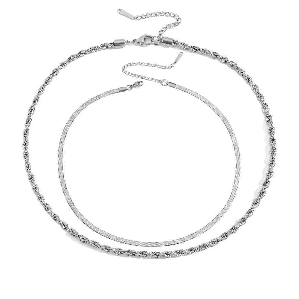 Silver-plated double chain necklace on a white background