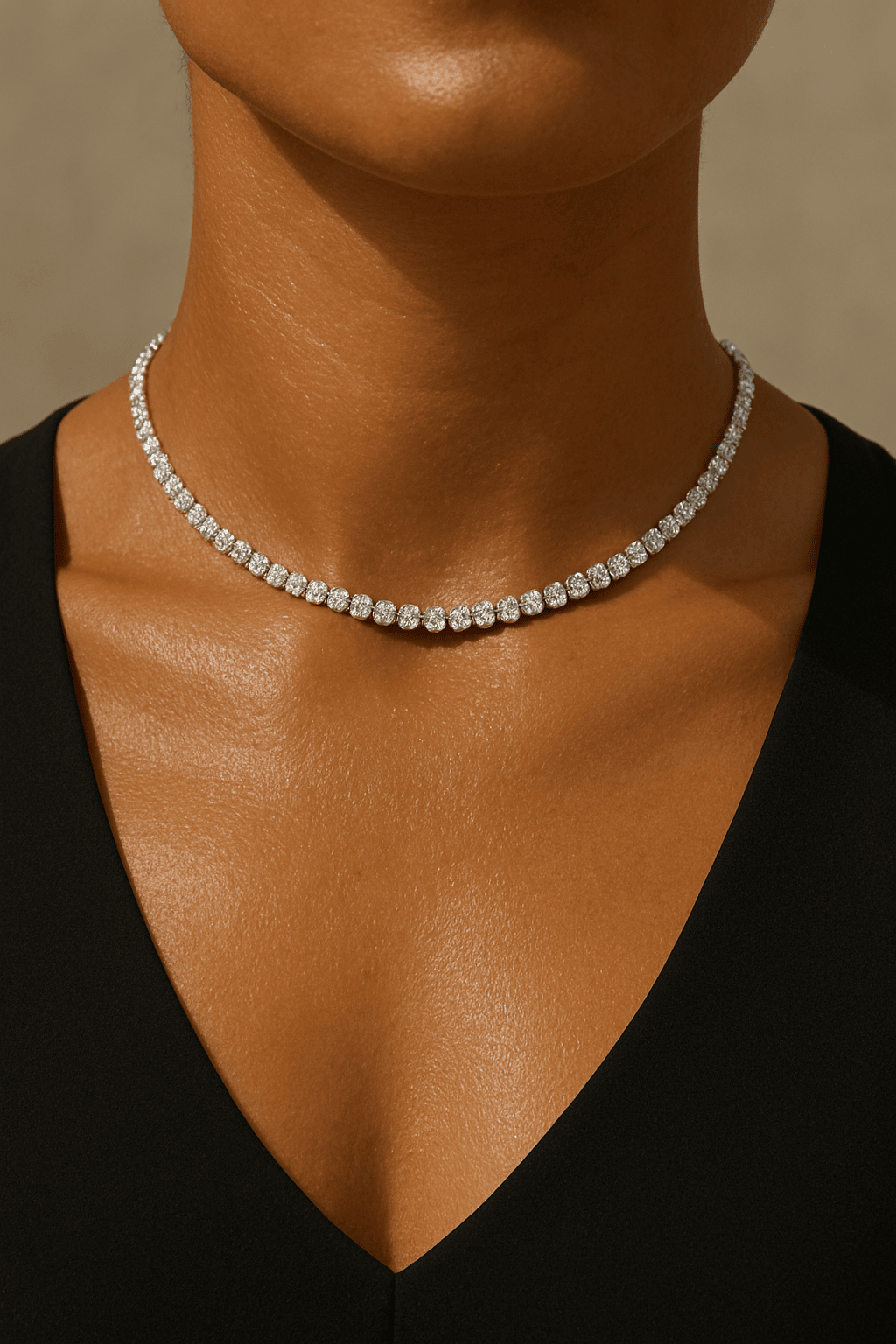 Close-up of a silver diamond waterproof choker on a model 